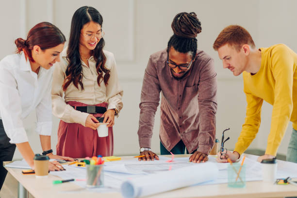 istock Multiracial team of engineers or architects having a meeting in an office 1482487282