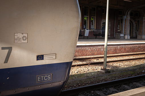 Picture of an ETCS logo on a cross border train from belgium to netherlands in maastricht train station. The European Train Control System is the signalling and control component of the European Rail Traffic Management System. It is a replacement for legacy train protection systems and designed to replace the many incompatible safety systems currently used by European railways.