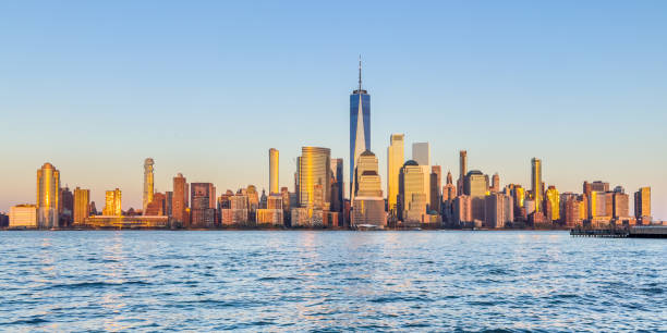 istock Sunset view of lower Manhattan from Jersey City waterfront 1482499670