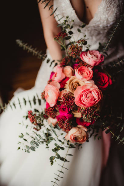 istock Bride holding flower bouquet in her hands 1482502866
