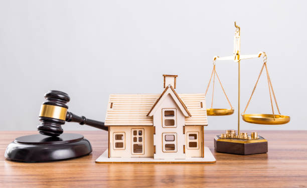 istock Judge hammer and house model 1482507414