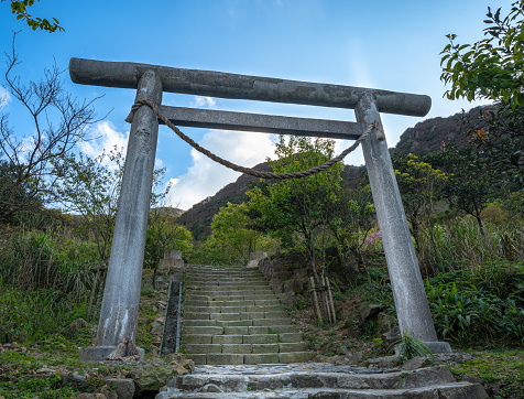Historic Torii of Jinguashi shrine standing on the path, way leads to the shrine, in New Taipei City, Taiwan.