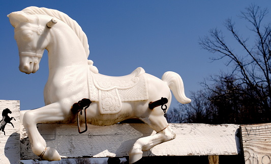 A white small horse statue was seen at the gate in Joe Huber's farm and restaurant located at Borden, Indiana