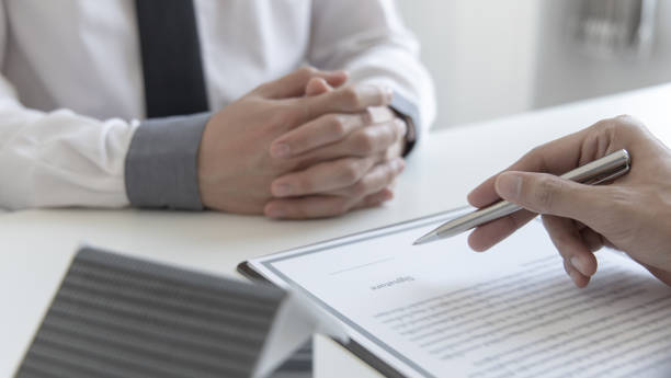 istock Real estate agent or sales manager has proposed terms 1482512393