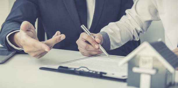 istock Real estate agent or sales manager has proposed terms 1482512442