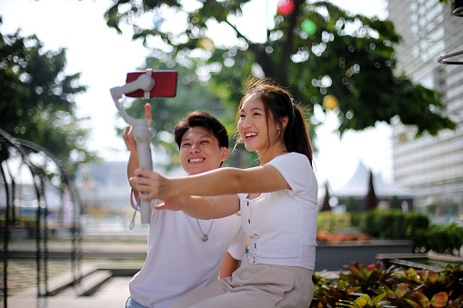 Asian young adults are doing livestreaming joyfully