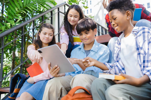 istock College students from diverse backgrounds studying with laptops, diverse college students studying 1482521346