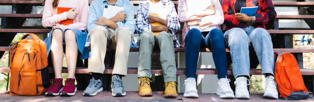 istock Group of young adults interacting on university grounds 1482521351