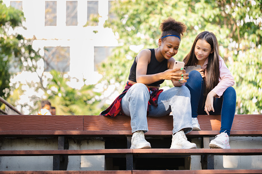 Diverse Students Using smart phone in School, Diversity in education, Education technology