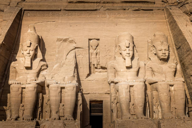 The statues of pharao ramses II in front of the temple of Abu Simbel, Egypt stock photo