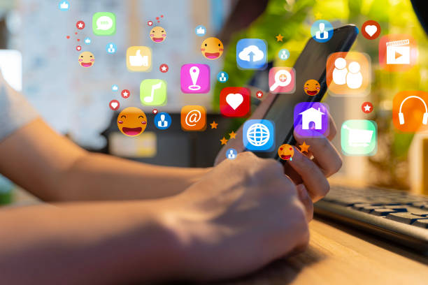 istock Woman using smartphone checking social media feeling happy. Social media or network on smartphone mobile, comments, likes and new followers 1482525372