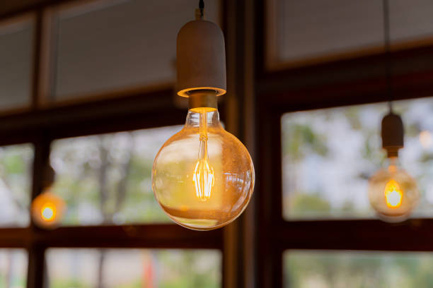 istock Retro luxury interior light lamp for home lighting decor. Illuminated. glowing LED lamps in the interior. Modern wire ceiling lights. 1482525651