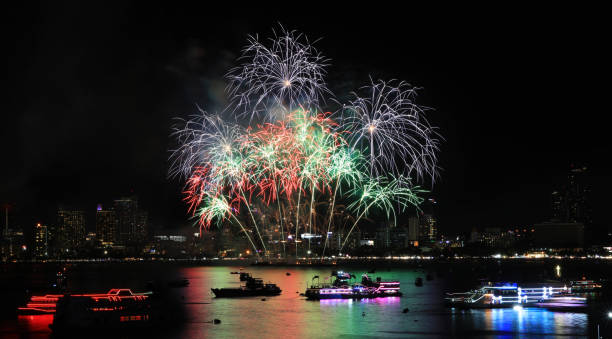 istock Huge beautiful firework over bay on beach, elegant celebration international firework over the beach of Pattaya , Tourism promotion 1482526691
