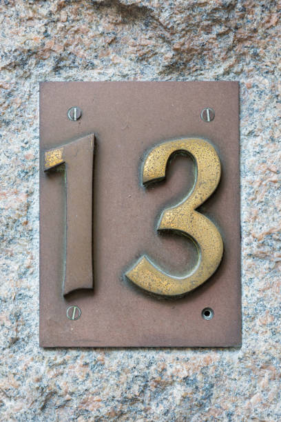 istock Old metal house number on the wall 1482531955