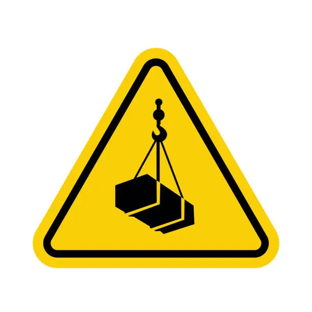 Vector illustration of Crane sign. Crane warning sign with suspended load. Yellow triangle sign with a crate attached to a hook inside. Caution crane, stay clear of suspended loads. Loading cargo by crane. Overhead crane.