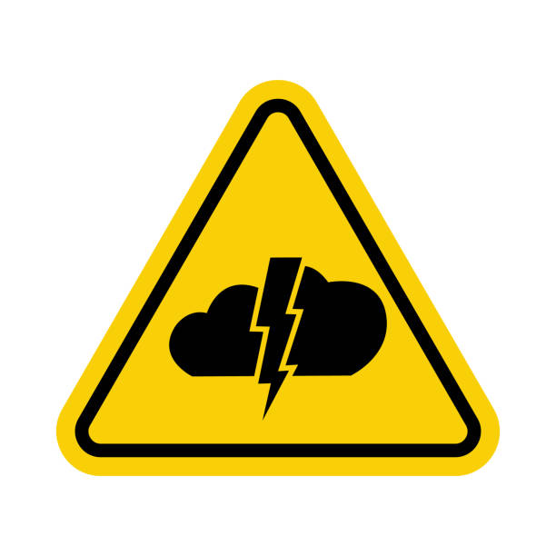 istock Storm warning sign. Yellow triangle sign with lightning and cloud icon inside. Beware of bad weather. Thunderstorm danger. Watch out for lightning bolts. Bad weather, hurricane, thunderstorm, storm, squally wind. 1482533593