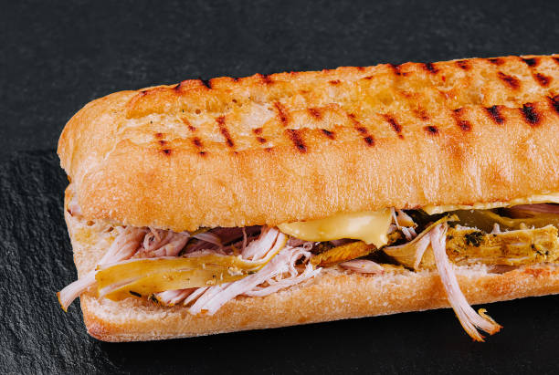 istock Big sandwich with chicken on stone board 1482536501