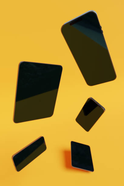 istock Smartphones and tablets floating in yellow background, 3d rendering. Modern digital technology, communication, apps and advertising concept 1482537900
