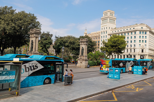 Barcelona, Spain - august 2022: Bus Stops in Placa de Catalunya or Catalonia Square in Barcelona, Spain.