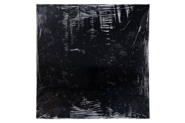 Black vinyl record cover wrapped in plastic