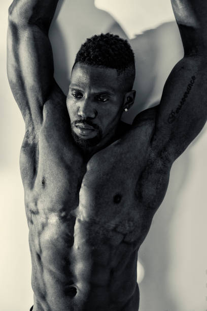 istock African American bodybuilder man, naked muscular torso 1482544575