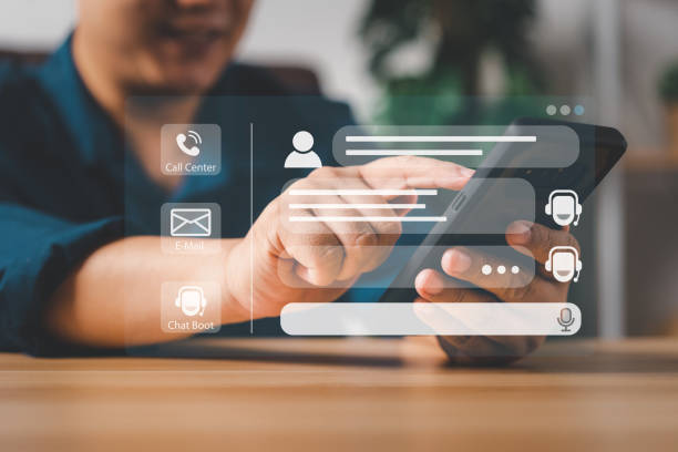 istock Person use customer service and support live chat with chatbot and automatic messages, Artificial intelligence, and CRM software technology. AI Chatbot smart digital customer service application. 1482550101
