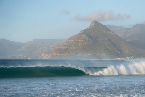 Wave Break A wave breaks at Long Beach, Kommetjie, in Cape Town, South Africa. kommetjie stock pictures, royalty-free photos & images