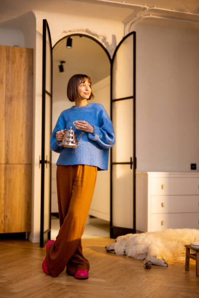 istock Woman spending leisure time on kitchen at home 1482558666