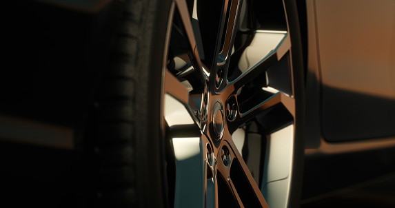 The rear wheel of the electric car, showing it from all sides. Close-up of the wheel of a modern car on alternative fuel