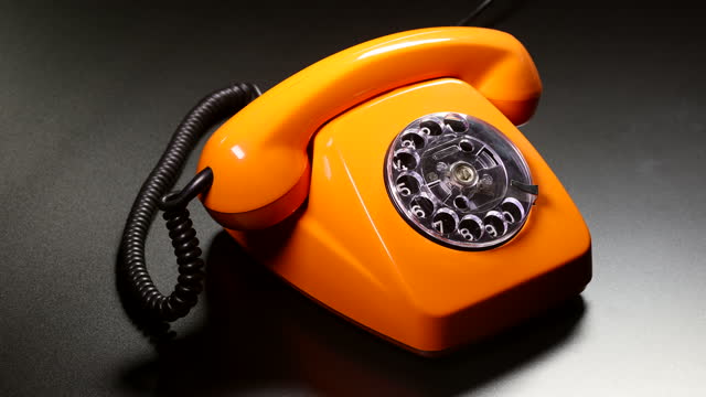 Old orange telephon