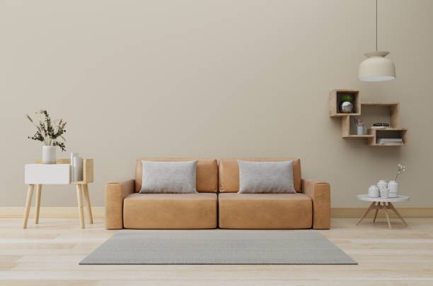 istock Luxurious apartment background wall mockup with leather sofa and decor on cream color background. 1482566260
