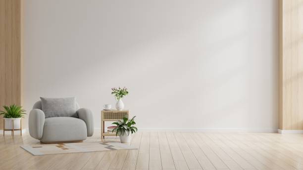 istock Contemporary interior design with an gray armchair on empty white color wall background. 1482566801
