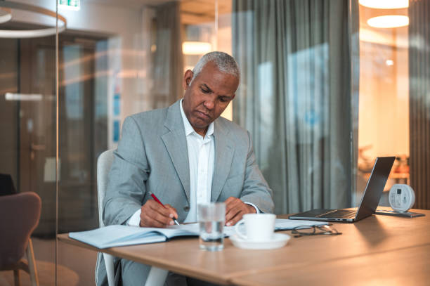 istock Mature Hispanic Businessman Preparing For Job Interview 1482570248