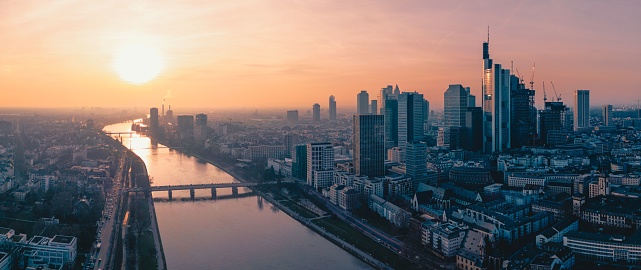 A cityscape of Frankfurt am Mein, Germany during a beautiful sunset