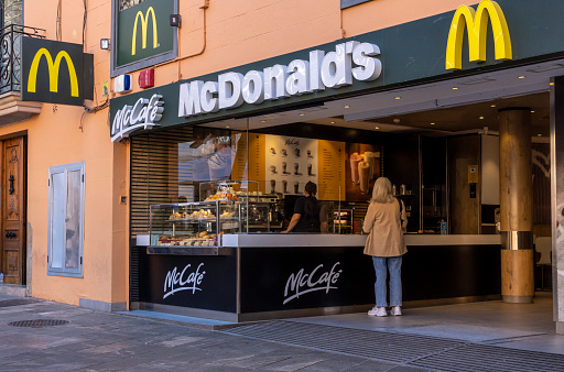 Palma de Mallorca, Spain; april 03 2023: Main entrance to a fast food chain restaurant, McDonald's, in the city of Palma de Mallorca, Spain