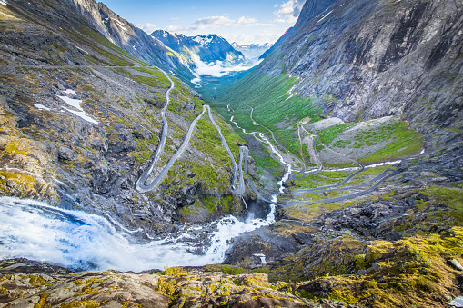 Aerial view of a winding road and valley on the famous Trollstigen mountain pass road in Norway