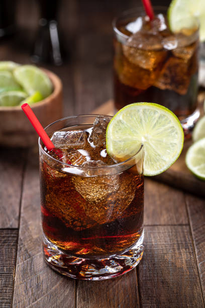 istock Rum and cola cocktail with lime slice 1482593727