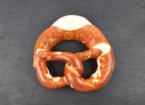 Hearty pretzels on a black background