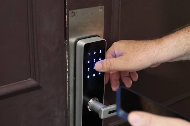 istock Man opens door to hotel room 1482609109