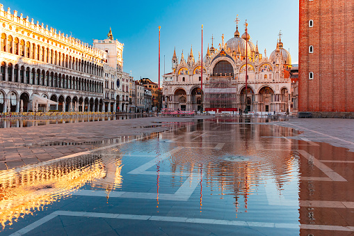 Venice at sunrise, deluged by flood water during High water, Italy
