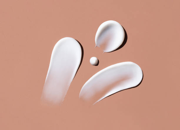 istock cosmetic smears cream texture on brown background 1482611585