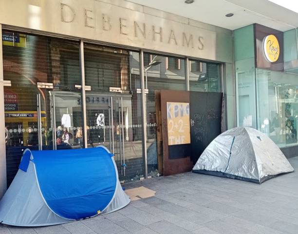 Homeless tents 14th April 2023, Dublin, Ireland. Homeless persons' tents outside the now closed down Debenhams department store on Henry Street, Dublin city centre. coalition building stock pictures, royalty-free photos & images