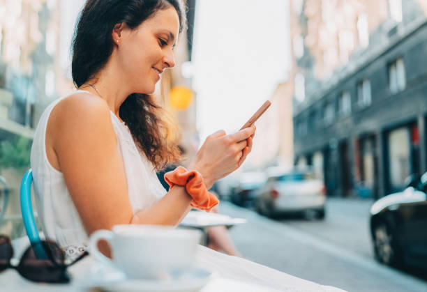 istock Tourist at sidewalk cafe drinking cappuccino with coconut milk 1482617955