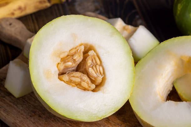 istock Cut into pieces ripe yellow melon with sweet pulp 1482619258