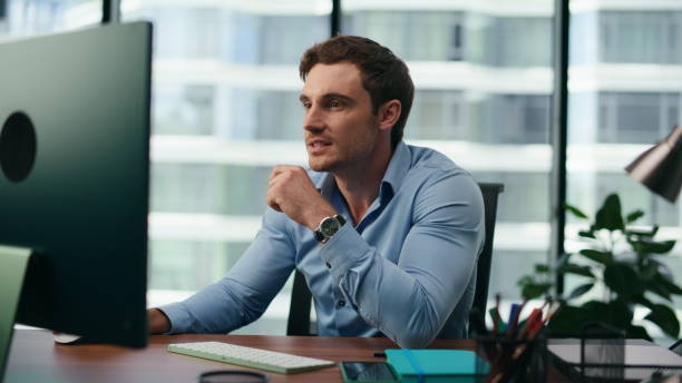 istock Happy manager satisfied results corporate work looking office computer close up 1482619353