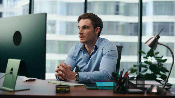 istock Office manager feeling happy reading news at computer closeup. Man rejoicing 1482619650