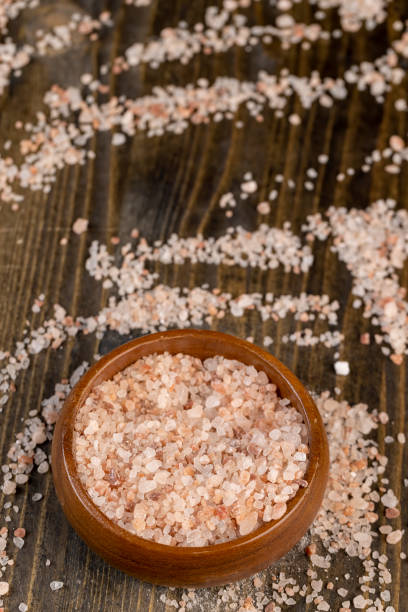 istock Pink natural salt on the table, close up 1482619891