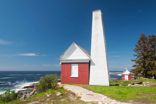 The Pemaquid Point bell house and wooden tower located in Bristol, Lincoln County, Maine, at the tip of the Pemaquid Neck.