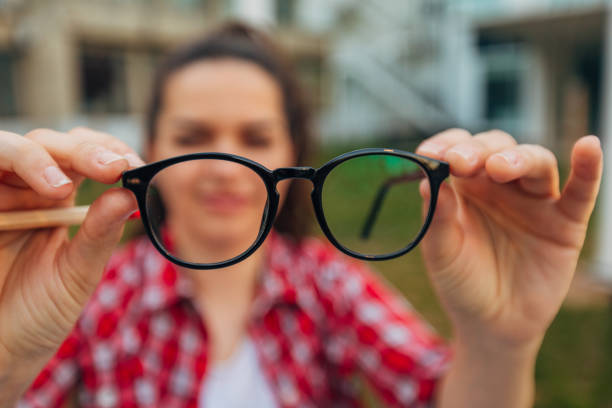 istock A woman is looking at her glasses 1482622583