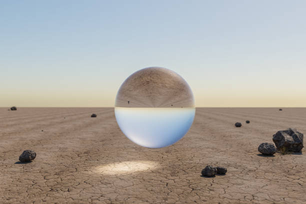 istock single glas sphere ball hovering in the air in large empty desert environment; abstract surreal concept; 3D Illustration 1482624146